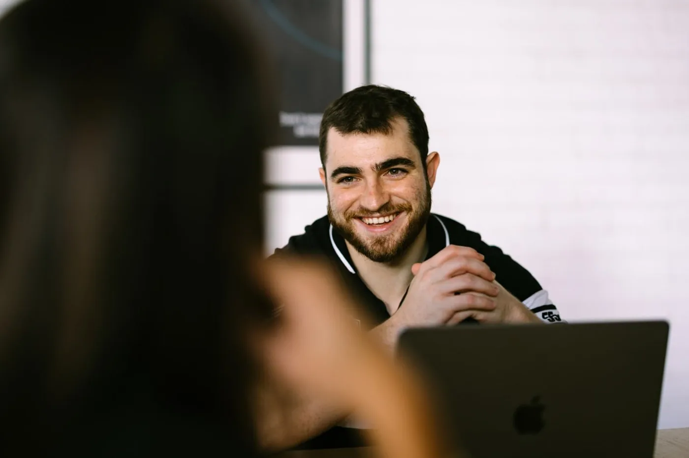 Jordan Pizzica running a Google Ads strategy session with a trade business owner